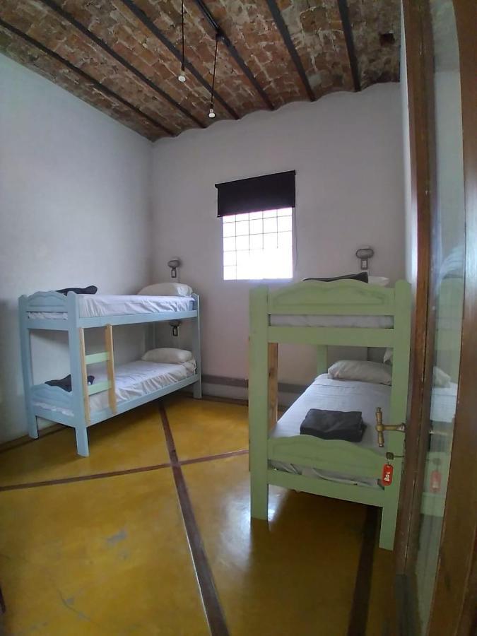 Cama en habitación femenina compartida de 4 camas