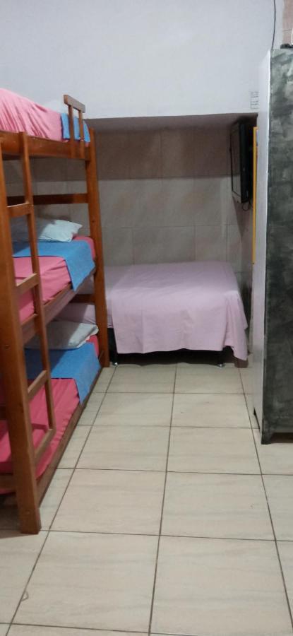 Cama individual en habitación compartida