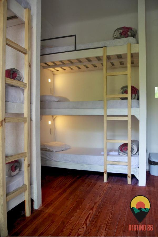 Cama individual en habitación compartida mixta