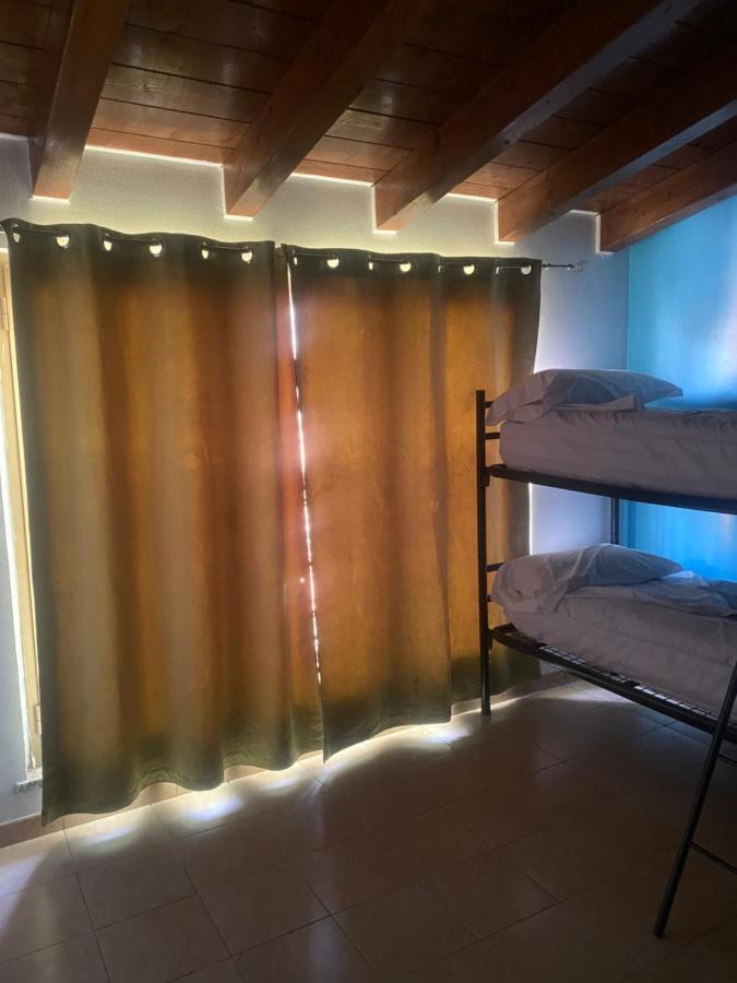 Cama en habitación compartida mixta de 4 literas
