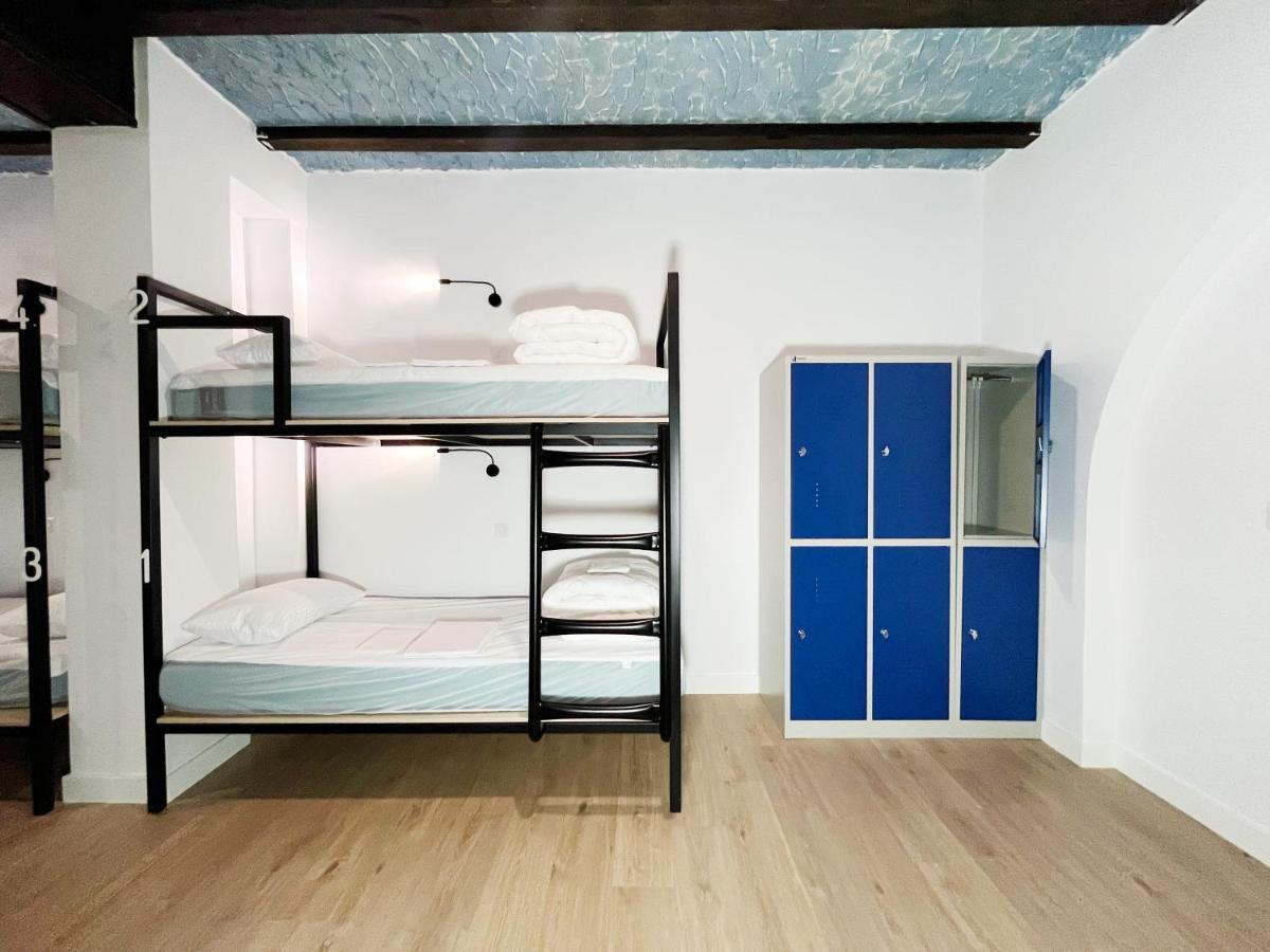 Cama en habitación compartida mixta de 8 camas