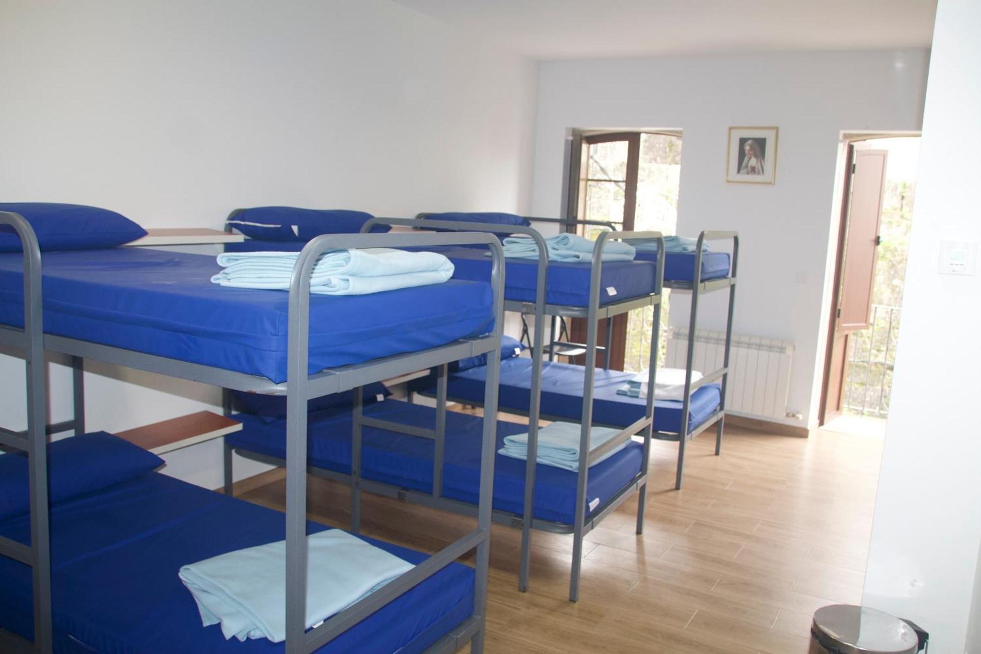 Cama individual en habitación compartida