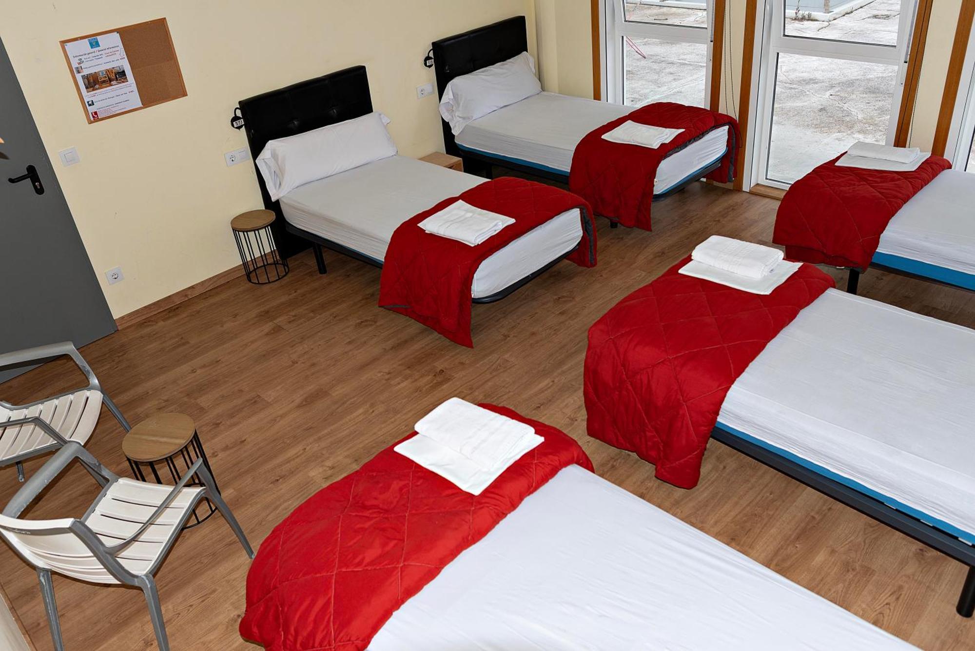 Cama individual en habitación compartida mixta