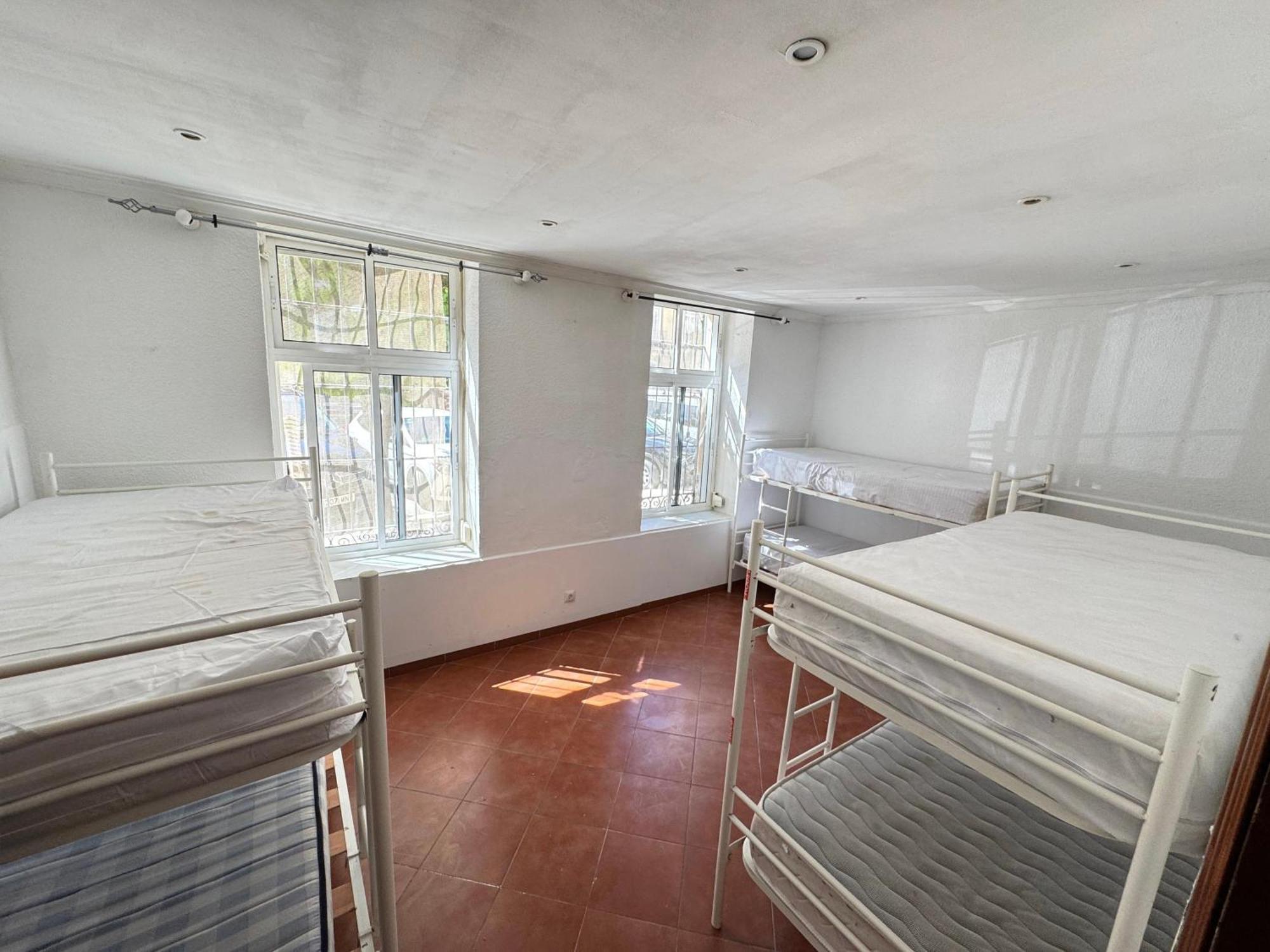 Cama en habitación compartida mixta de 6 camas