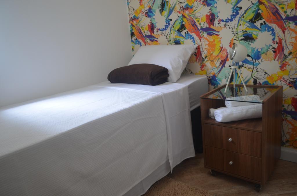 Quarto Individual com Banheiro Compartilhado