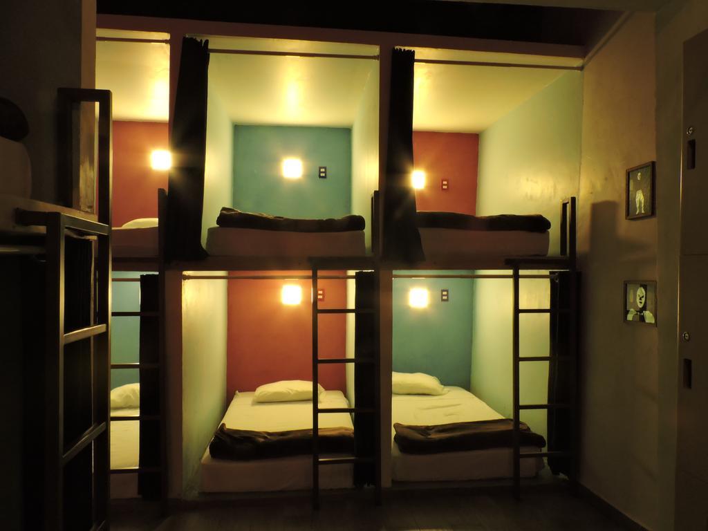 Cama individual en habitación compartida mixta