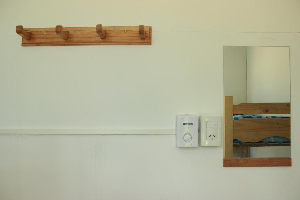 Cama en habitación compartida con 4 camas