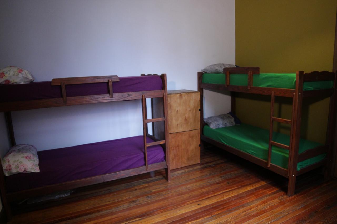 Cama en habitación compartida de 6 camas