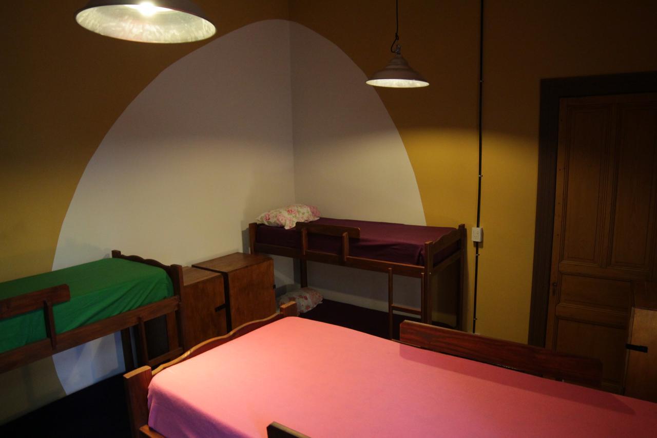 Cama individual en habitación compartida
