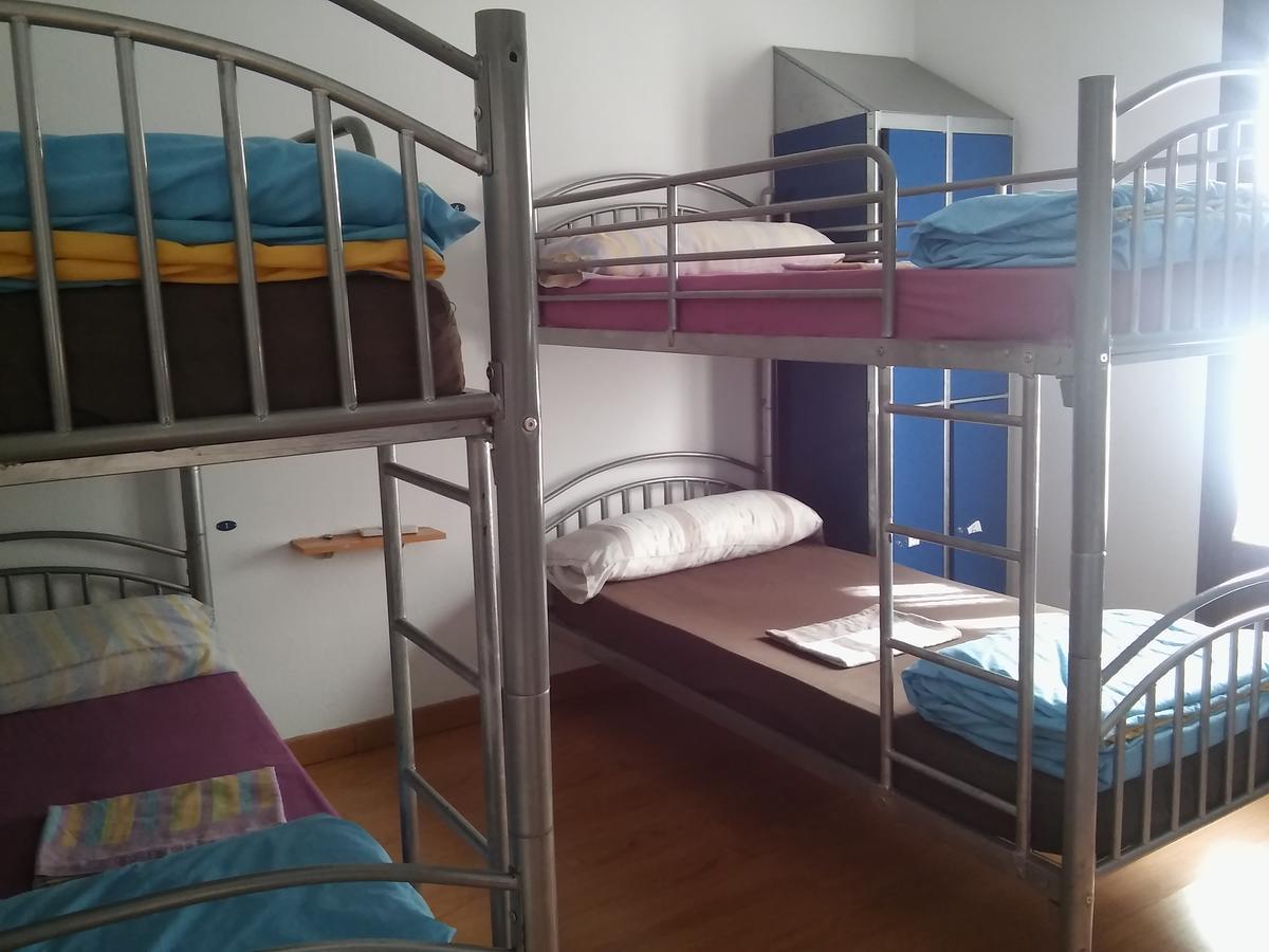 Cama en habitación compartida mixta de 6 camas