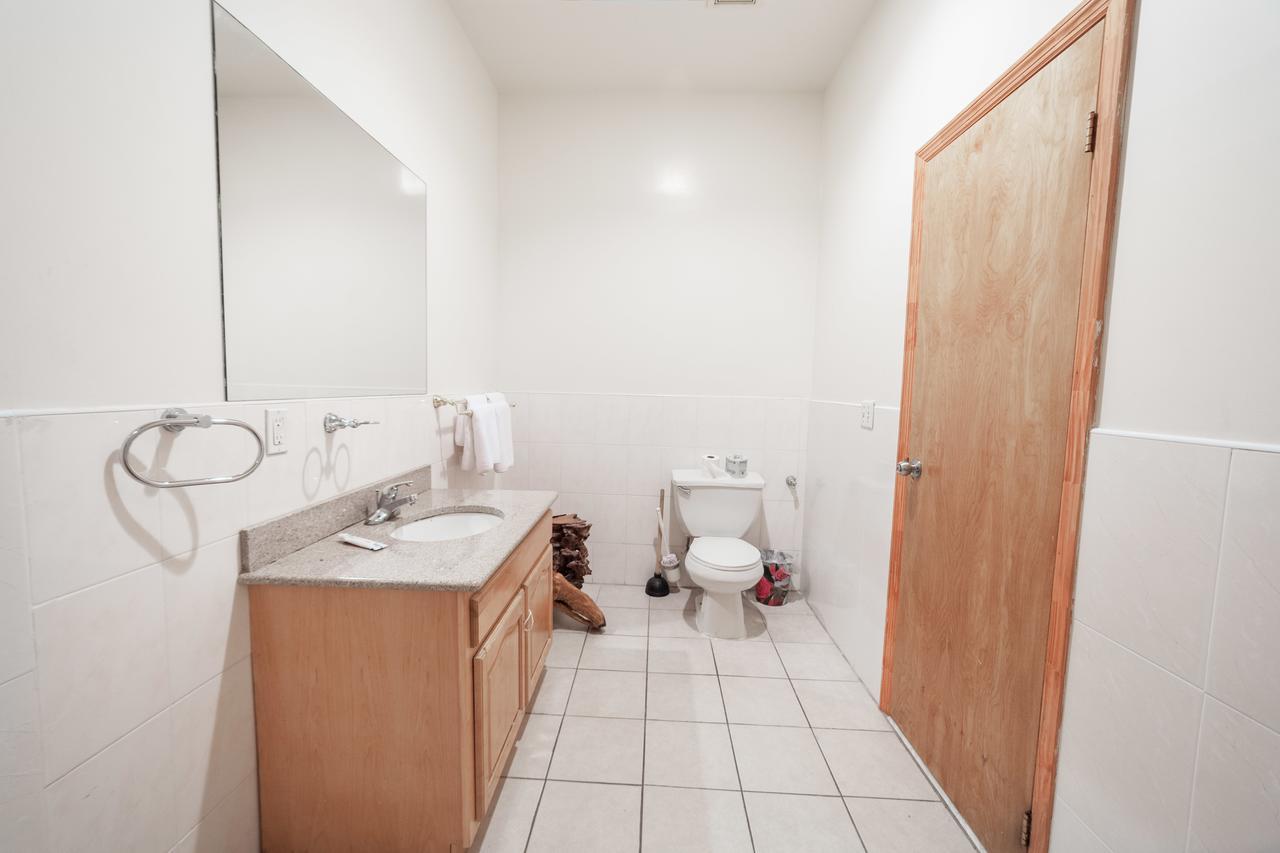 Habitación Cuádruple Deluxe con baño privado