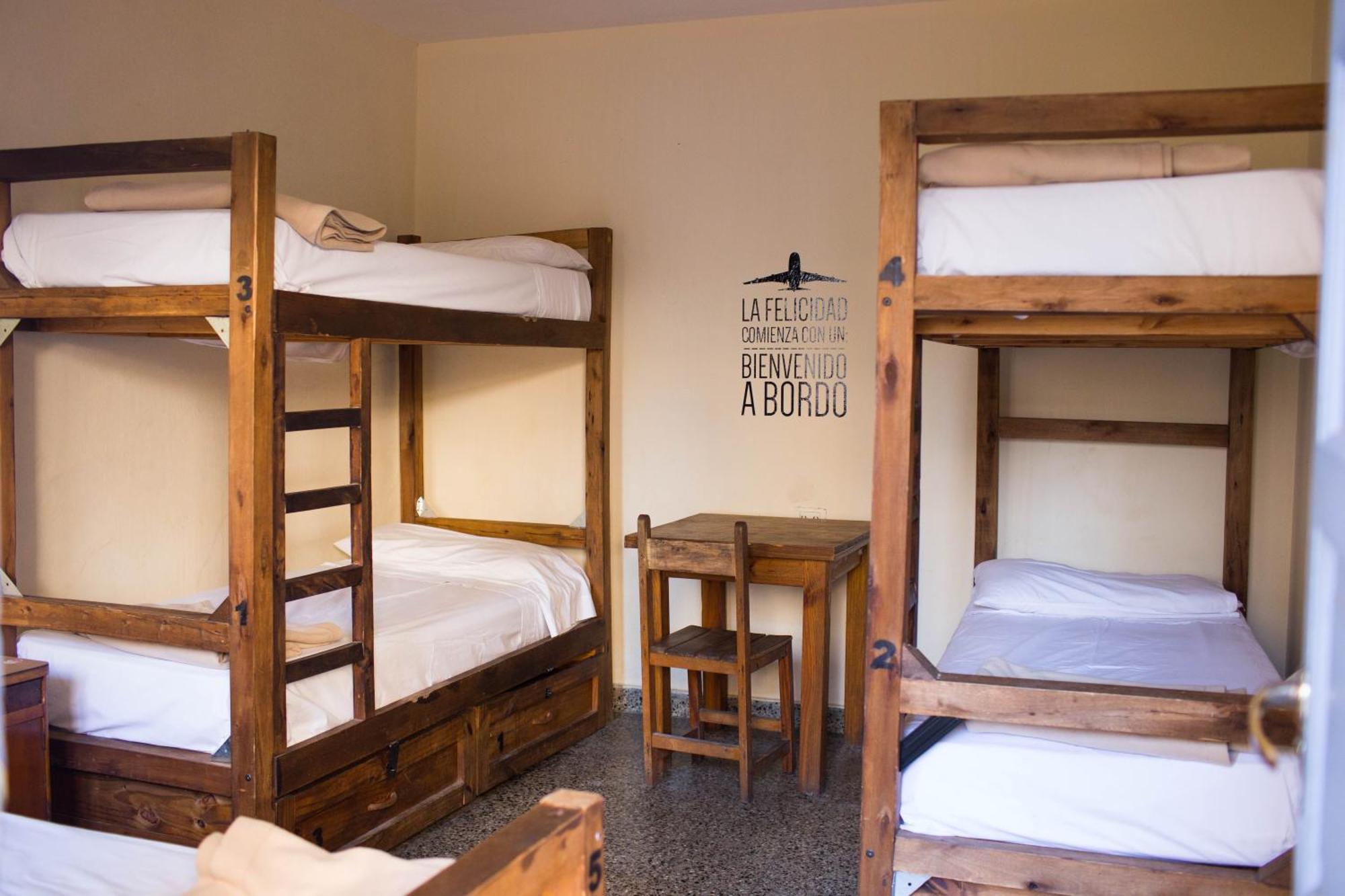 Cama individual en dormitorio mixto compartido (5 camas)