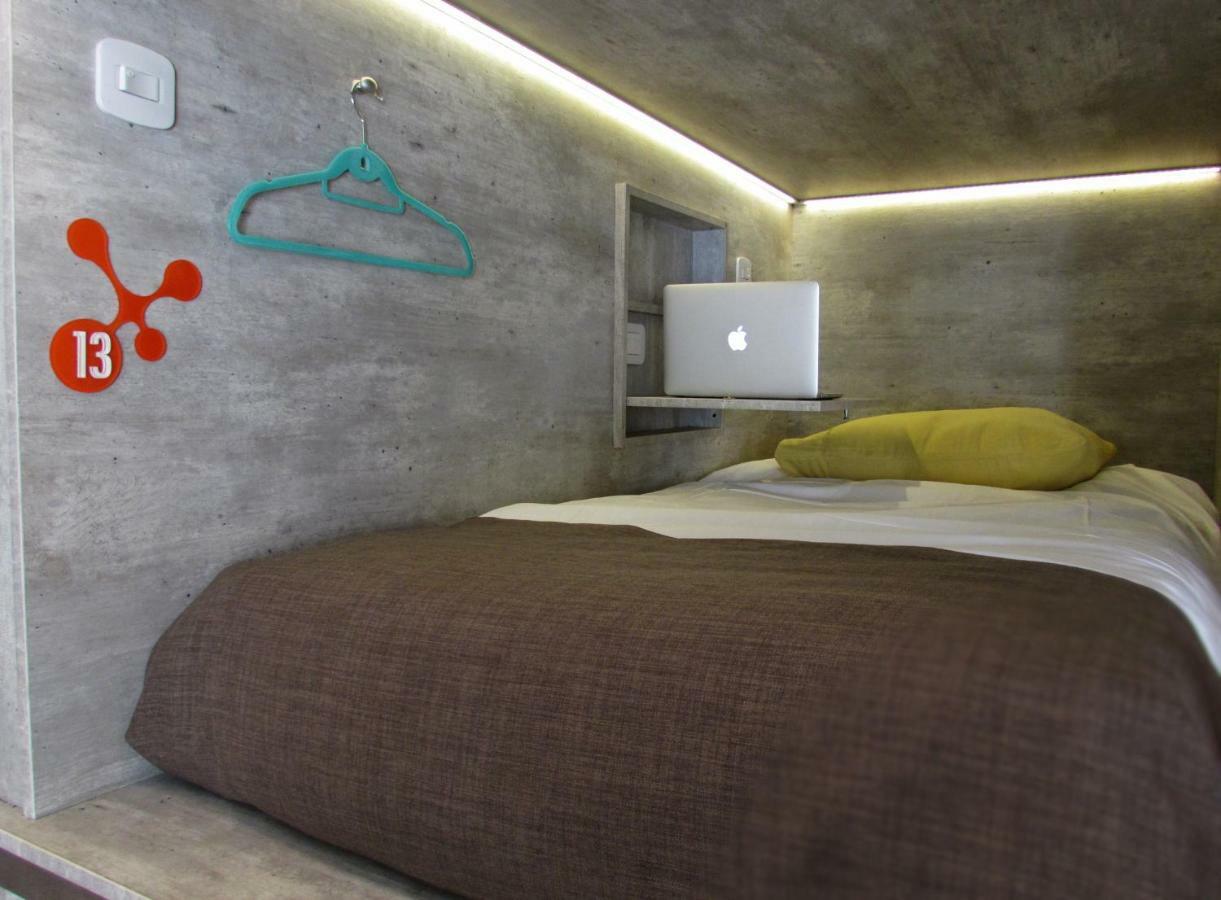 Cama en habitación compartida mixta de 4 camas