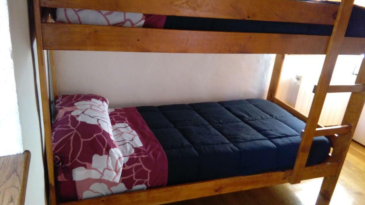 Litera en habitación compartida mixta