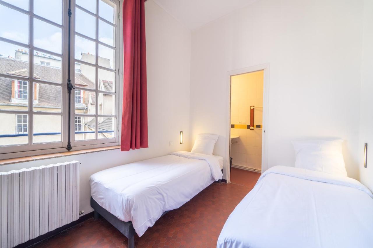 Quarto com 2 Camas de Solteiro